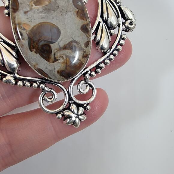 Handmade Silver Pendant with Fossil Coral and Red Garnet Accent - Picture 6 of 10